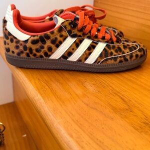 Adidas SambaLeopard Print Sneakers with White Stripes and Orange Accents